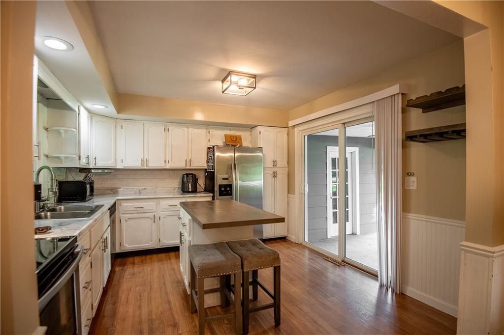 1010 South Keel Ridge Road Hermitage, PA 16148 - Photo 25 of 35 a kitchen with a table and chairs