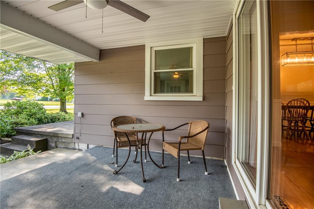 1010 South Keel Ridge Road Hermitage, PA 16148 - Photo 27 of 35 a patio with table and chairs and potted plants
