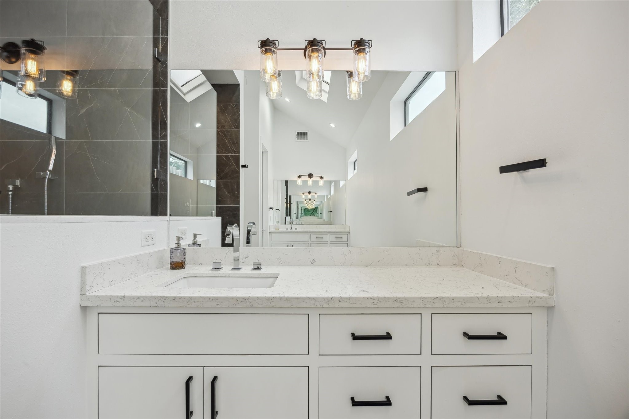 823 Aurora Street Houston, TX 77009 - Photo 13 of 23 One of the two quartz covered vanity stations