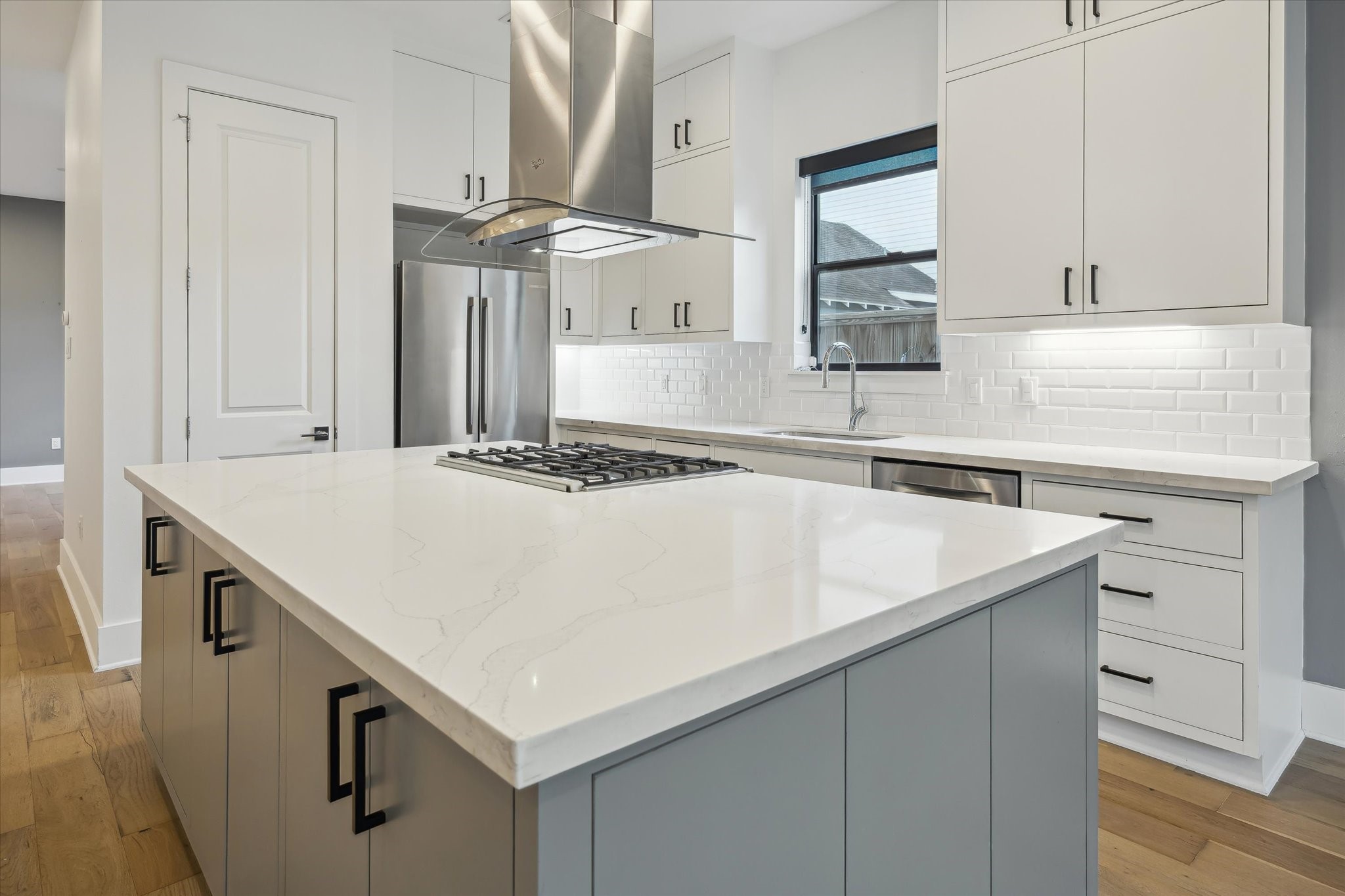 823 Aurora Street Houston, TX 77009 - Photo 6 of 23 Kitchen has a huge quartz covered storage island