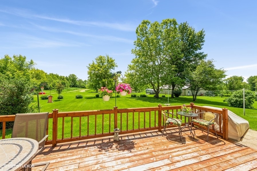 15817 Green Road Harvard, IL 60033 - Photo 18 of 25 a view of a chair and tables