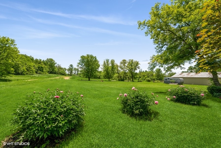 15817 Green Road Harvard, IL 60033 - Photo 20 of 25 a view of a garden with trees