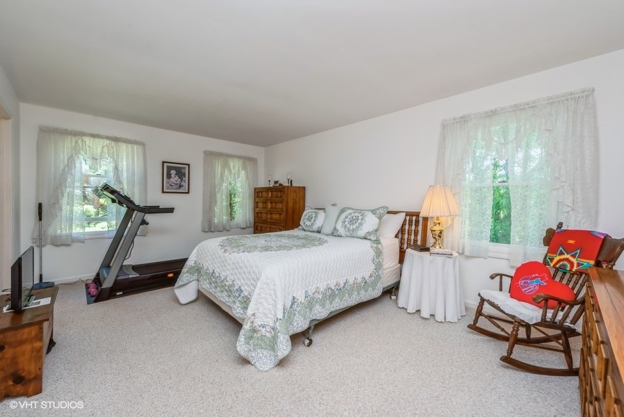 15817 Green Road Harvard, IL 60033 - Photo 9 of 25 a bedroom with a bed and window