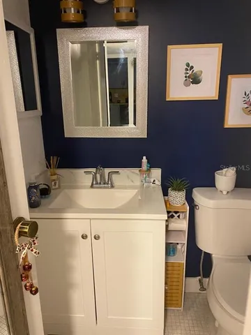 a bathroom with a sink and a toilet
