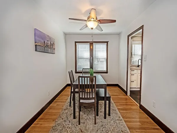 a view of a room with furniture window and wooden floor