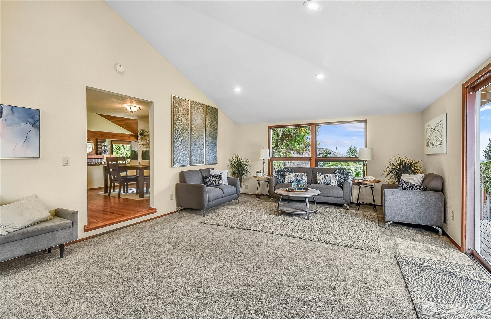 16901 Southeast 45th Street Bellevue, WA 98006 - Photo 11 of 29 a living room with furniture and a large window