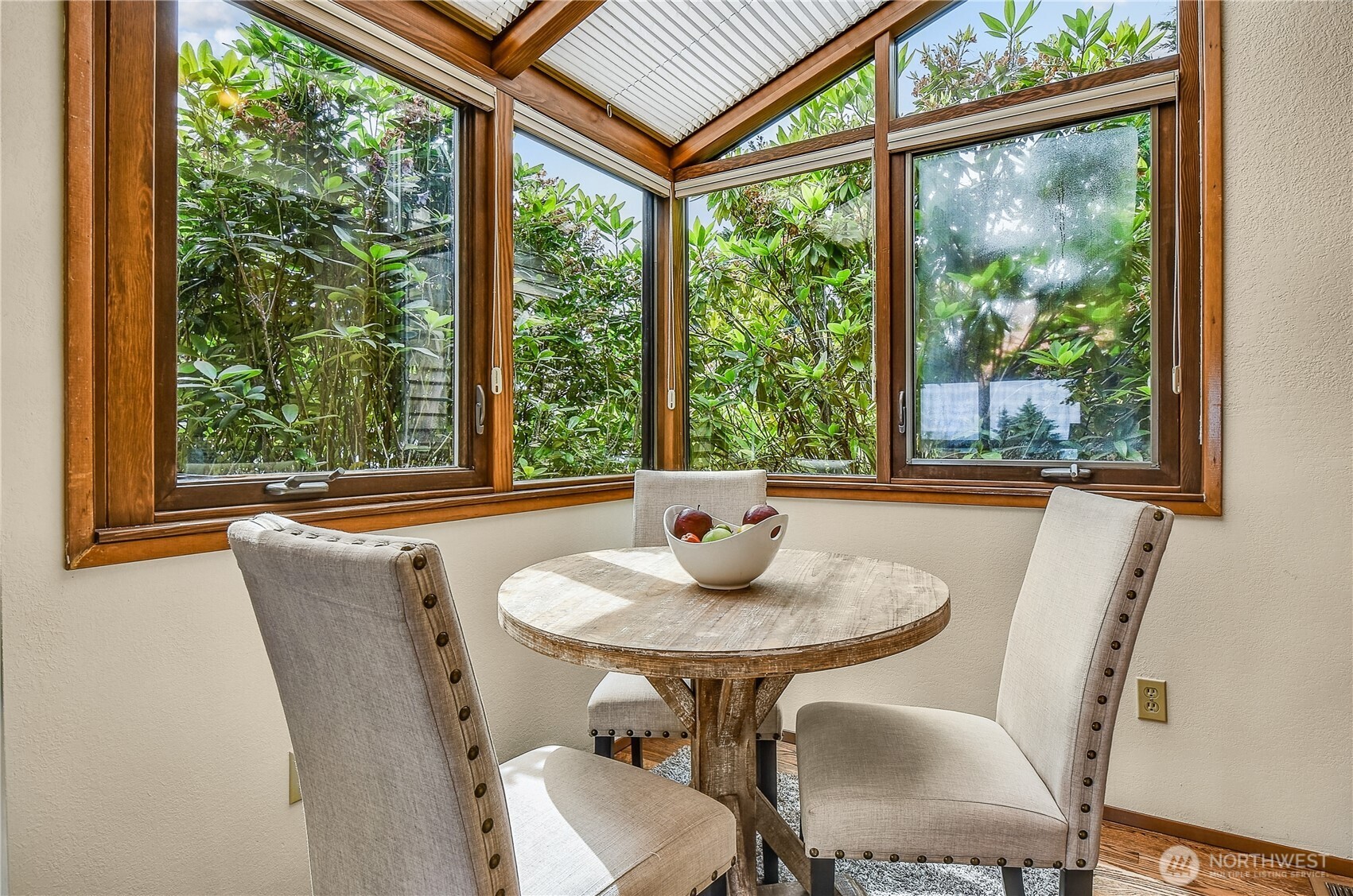 16901 Southeast 45th Street Bellevue, WA 98006 - Photo 14 of 29 a view of a dining room with furniture window and outside view