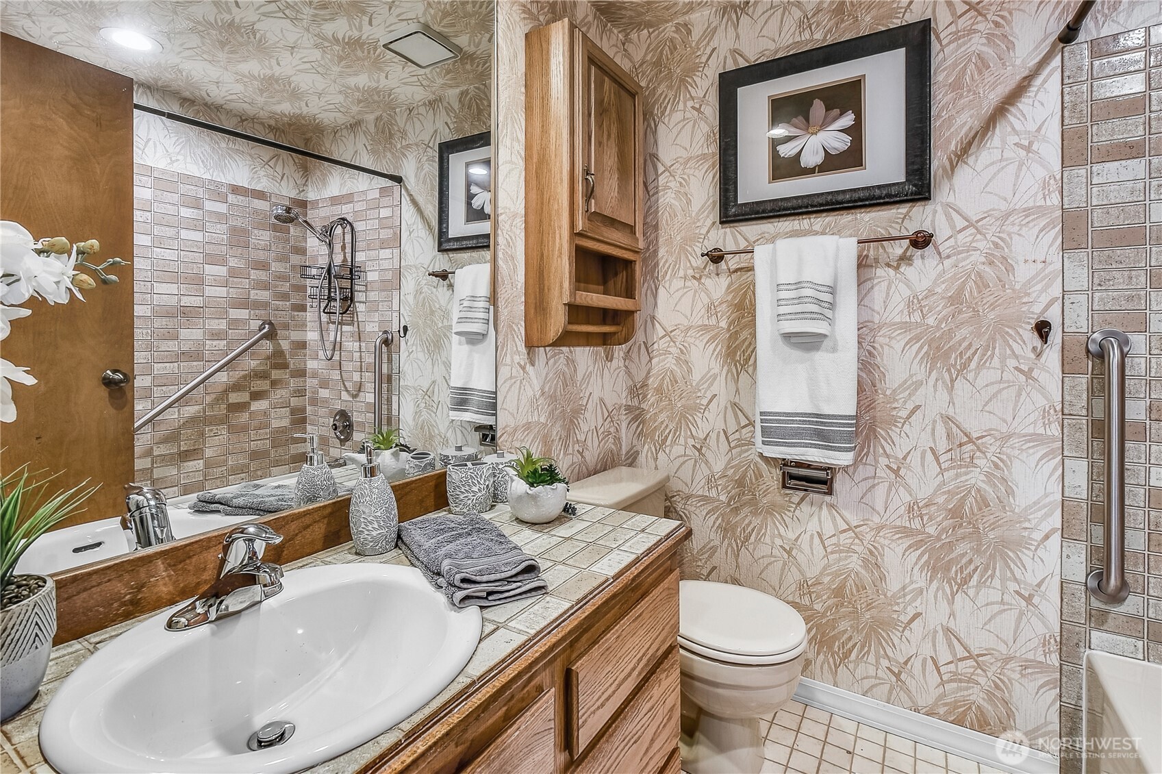 16901 Southeast 45th Street Bellevue, WA 98006 - Photo 20 of 29 a bathroom with a sink toilet and shower