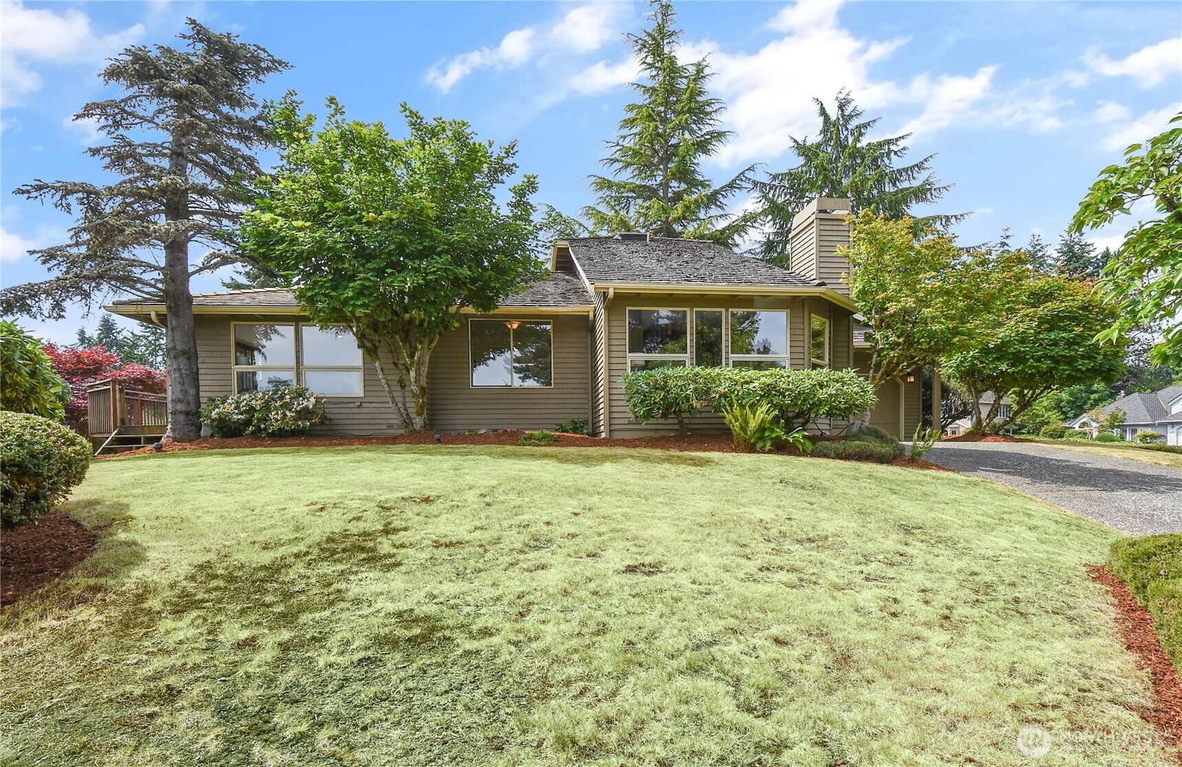 16901 Southeast 45th Street Bellevue, WA 98006 - Photo 2 of 29 a front view of house with yard and trees