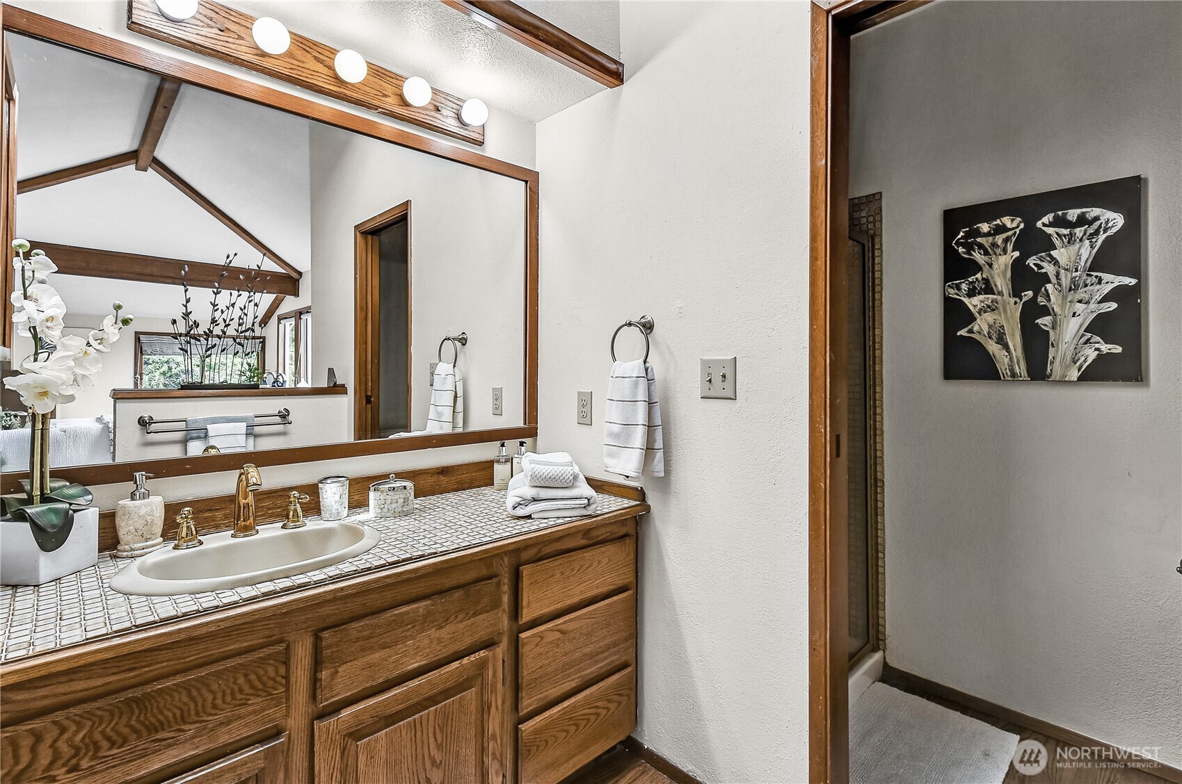 16901 Southeast 45th Street Bellevue, WA 98006 - Photo 22 of 29 a bathroom with a granite countertop double vanity sink and a mirror