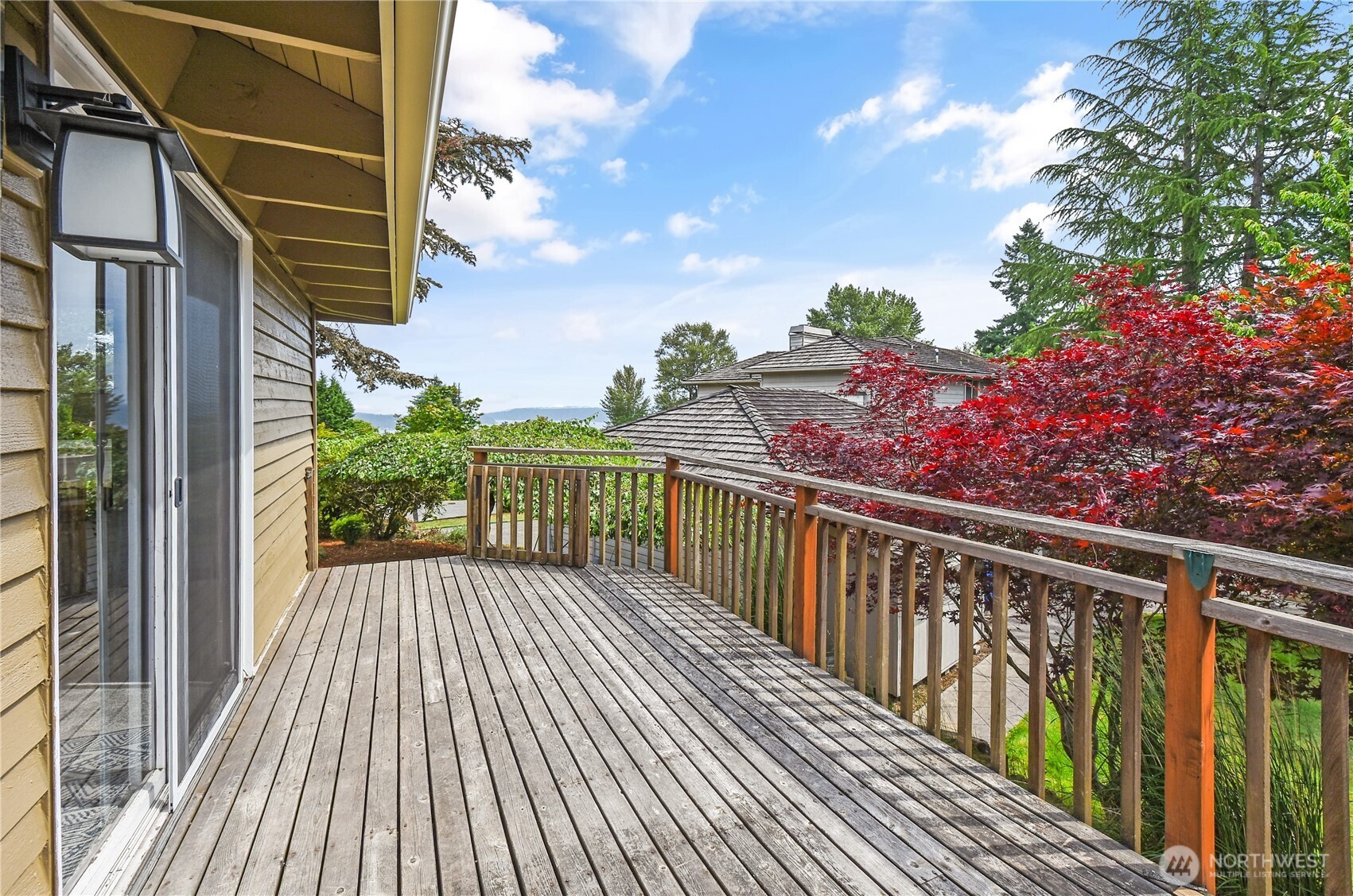 16901 Southeast 45th Street Bellevue, WA 98006 - Photo 25 of 29 a view of a balcony with wooden floor