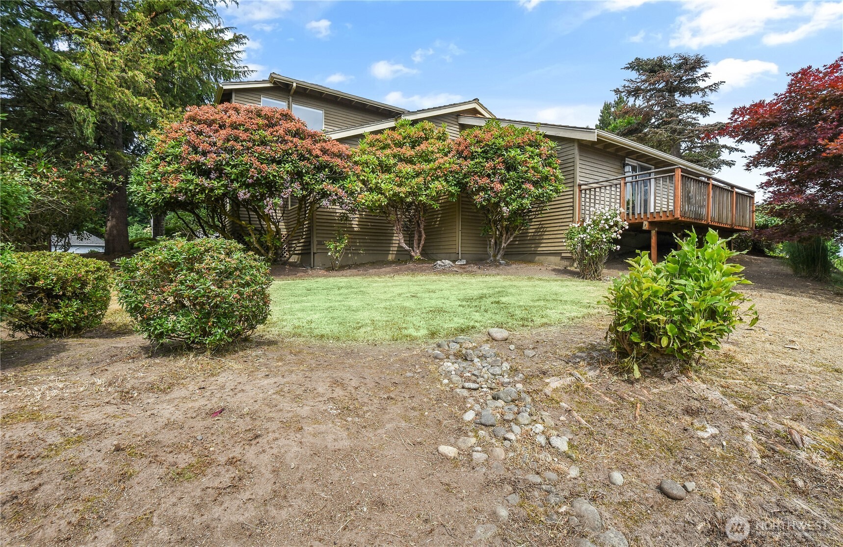 16901 Southeast 45th Street Bellevue, WA 98006 - Photo 26 of 29 a front view of a house with a yard