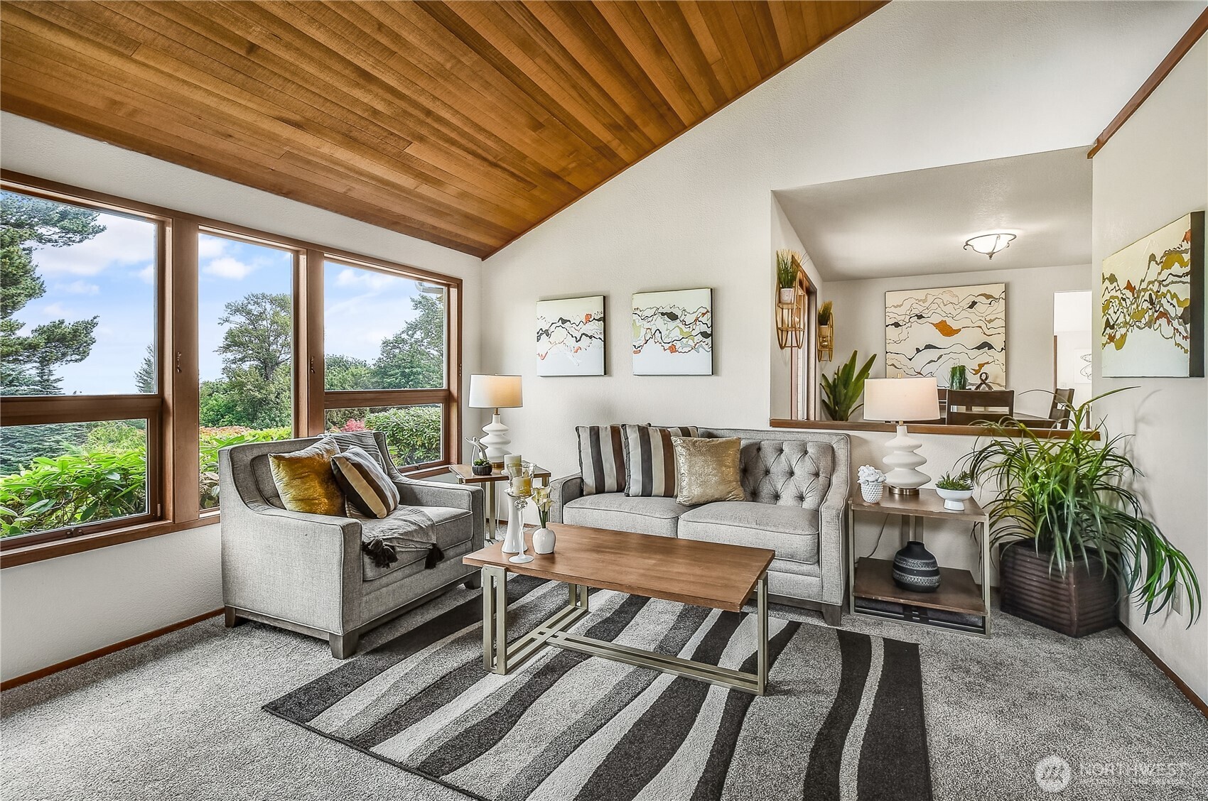 16901 Southeast 45th Street Bellevue, WA 98006 - Photo 5 of 29 a living room with furniture and a large window