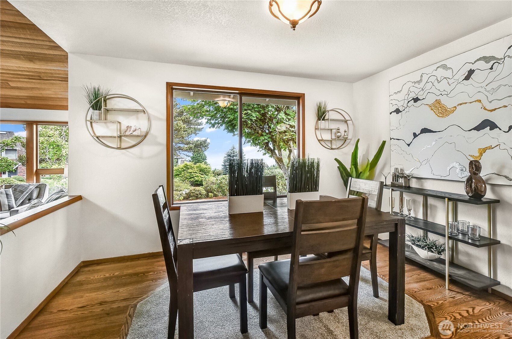 16901 Southeast 45th Street Bellevue, WA 98006 - Photo 7 of 29 a view of a dining room with furniture window and outside view