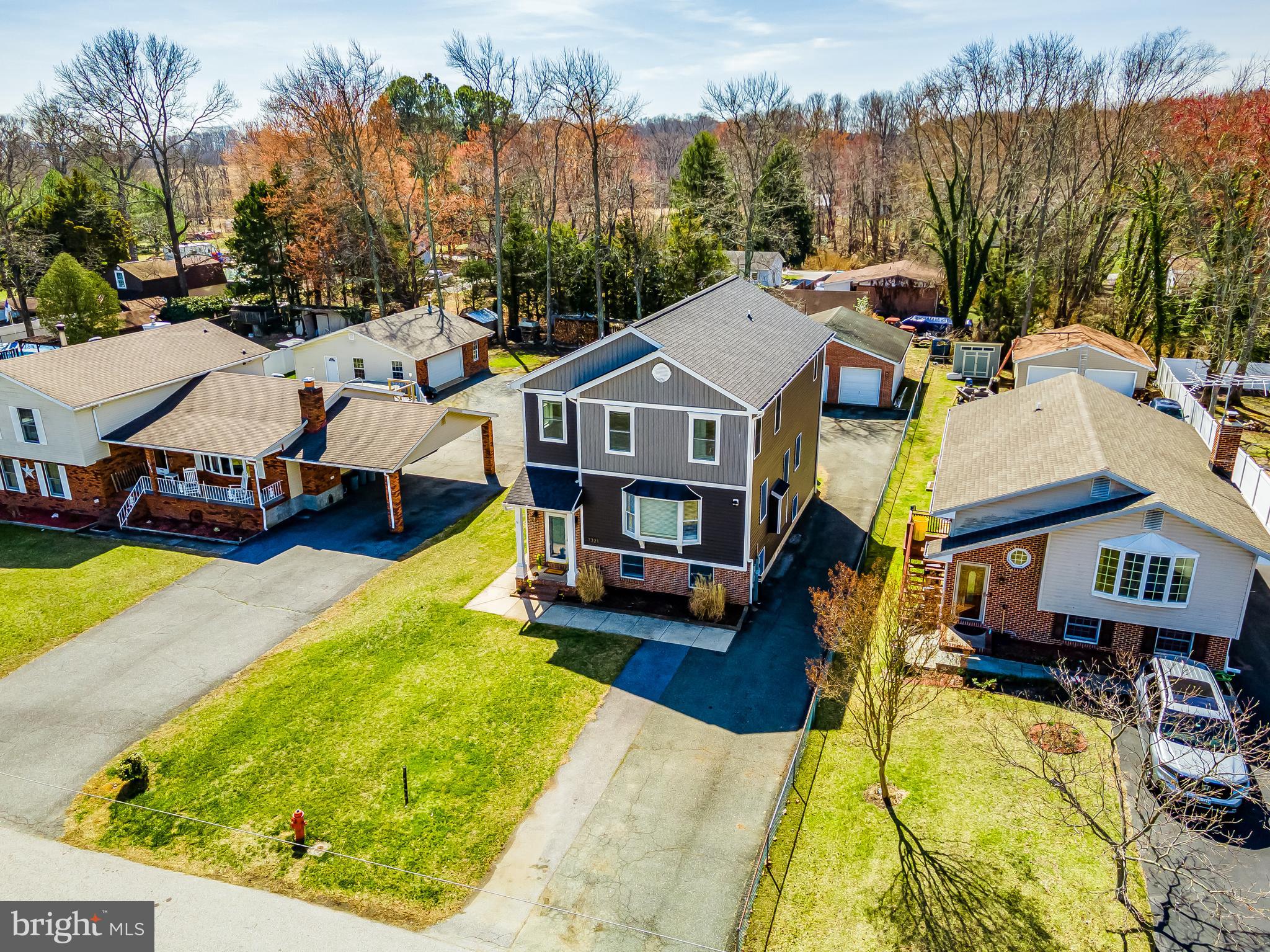 7321 Chesapeake Road Baltimore, MD 21220 - Photo 2 of 60 a view of a house with a swimming pool and sitting area