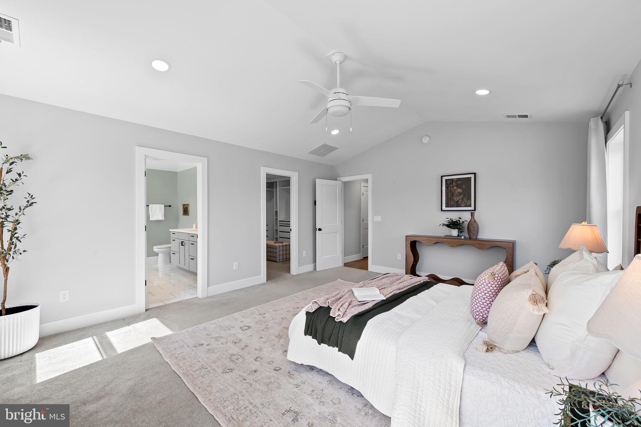 7321 Chesapeake Road Baltimore, MD 21220 - Photo 28 of 60 a bedroom with a large bed and a couch