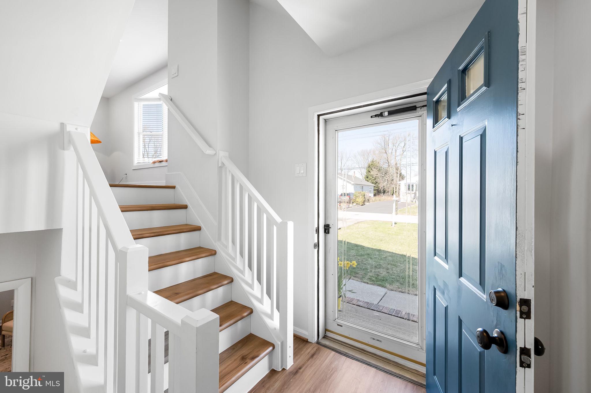 7321 Chesapeake Road Baltimore, MD 21220 - Photo 3 of 60 a view of an entryway with wooden floor and door