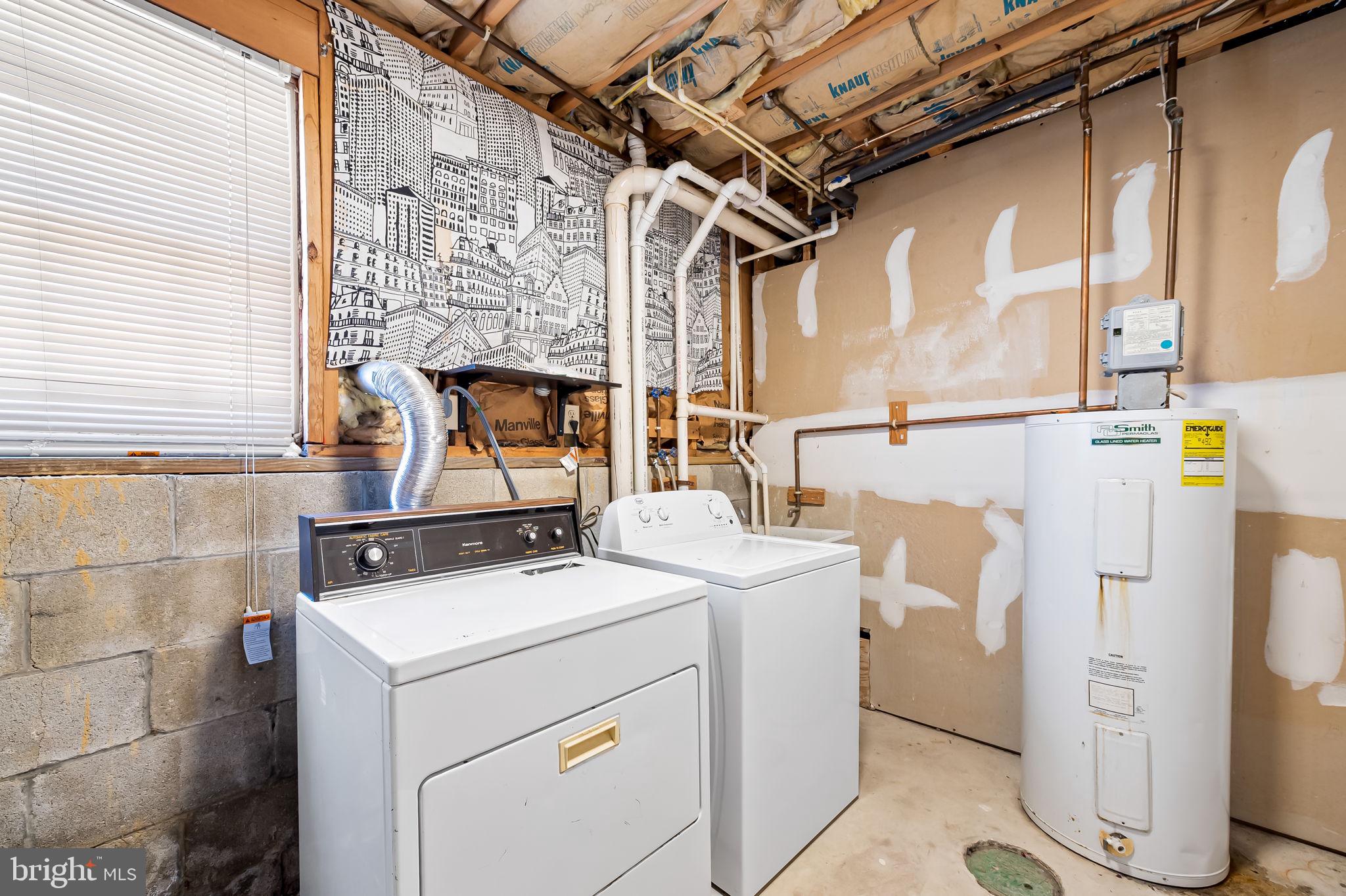 7321 Chesapeake Road Baltimore, MD 21220 - Photo 41 of 60 a utility room with dryer and washer
