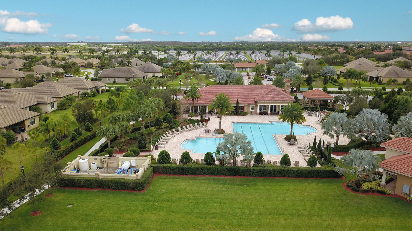 10635 Pisa Road Wellington, FL 33414 - Photo 14 of 20 Castellina clubhouse and pool aerial 3