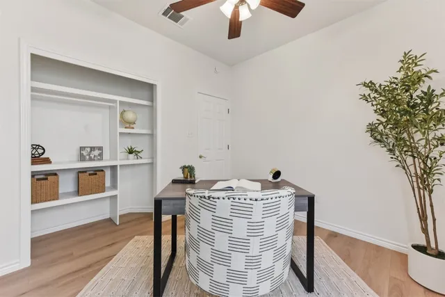 a view of a two chair in the patio