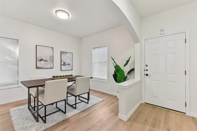a view of a dining room with furniture