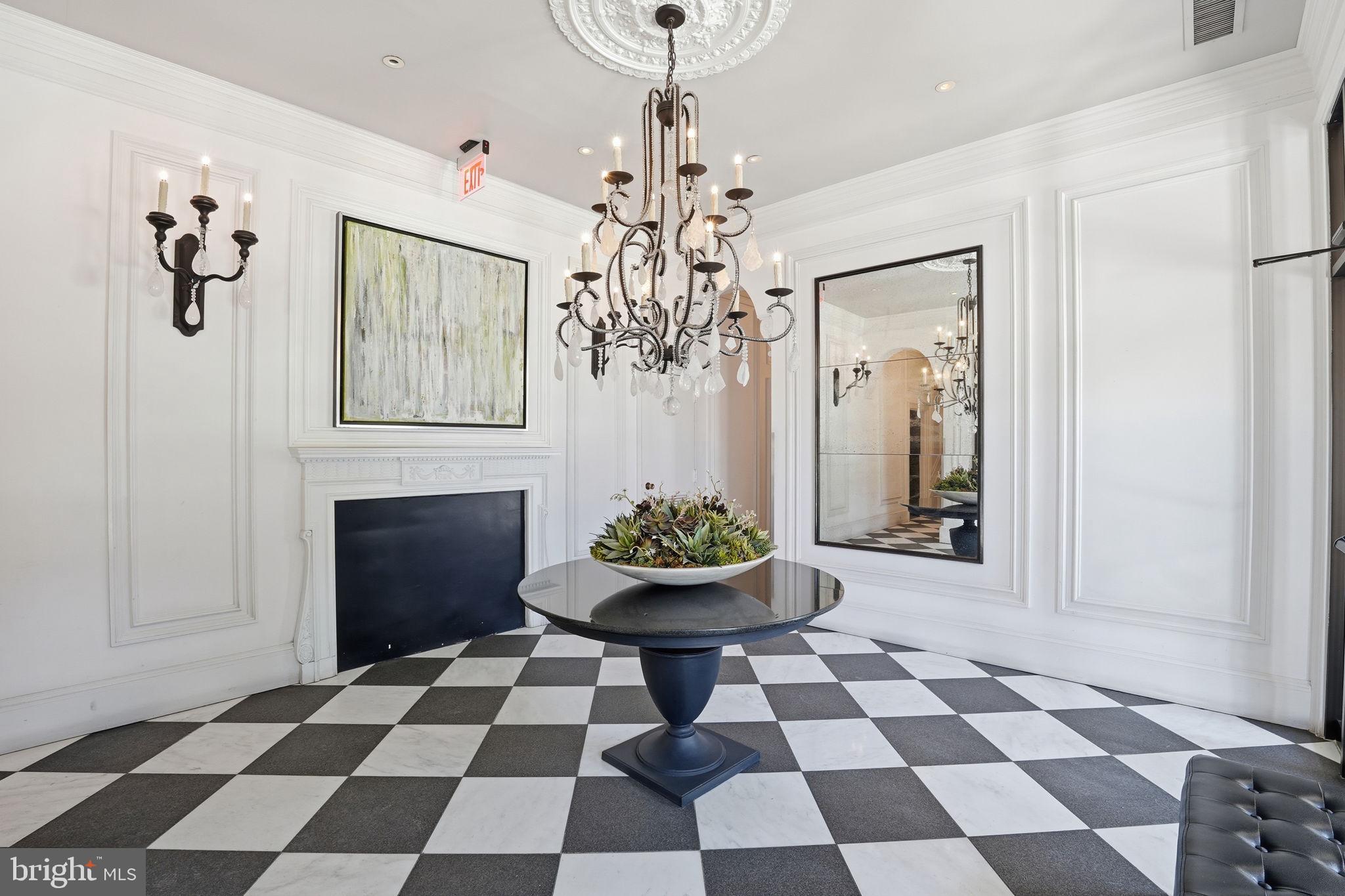2001 16th Street Northwest, Unit 202 Washington, DC 20009 - Photo 19 of 20 a living room with a black and white checkered floor