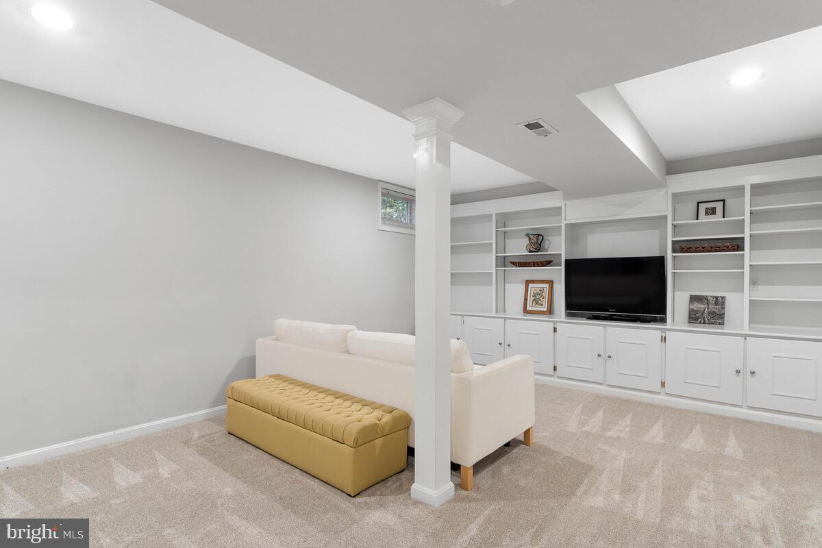 204 Hart Road Gaithersburg, MD 20878 - Photo 38 of 67 Lower Level Recreation Room with Built-Ins