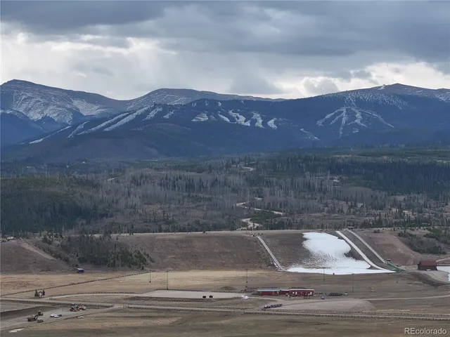 a view of a lake with a mountain
