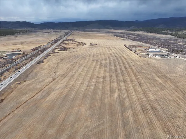 a view of a street with a mountain view