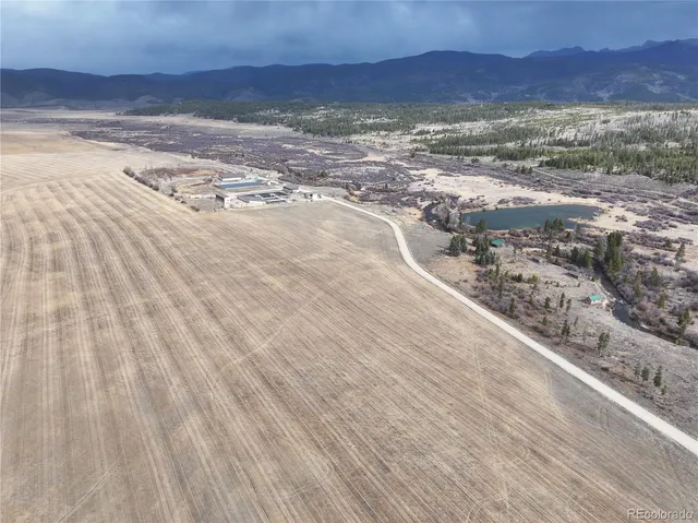 a view of mountains and mountain in the background