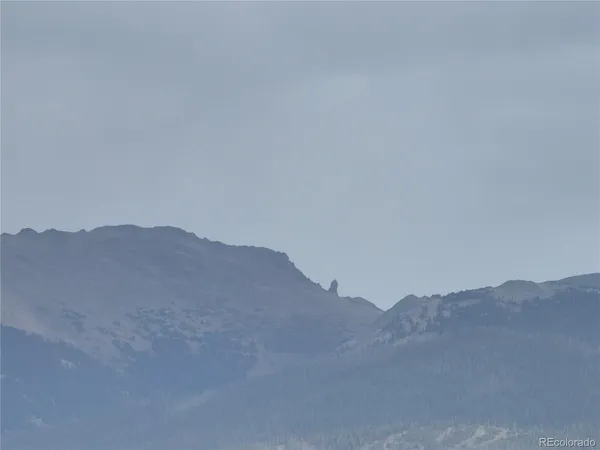 a view of a lake with a mountain