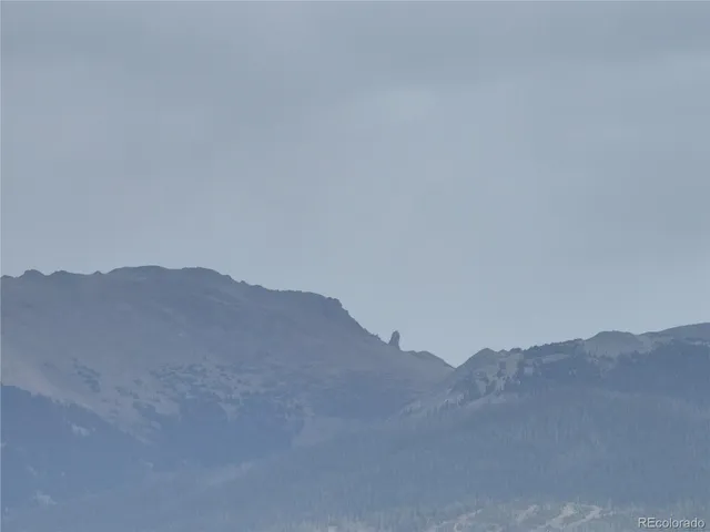 a view of a lake with a mountain