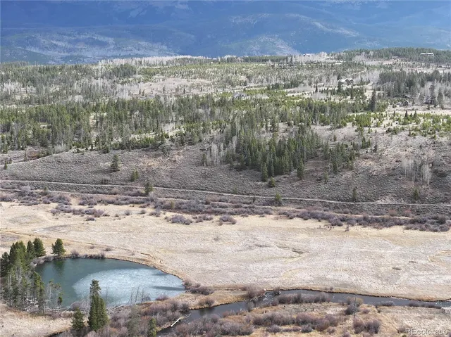 a view of a lake with a mountain
