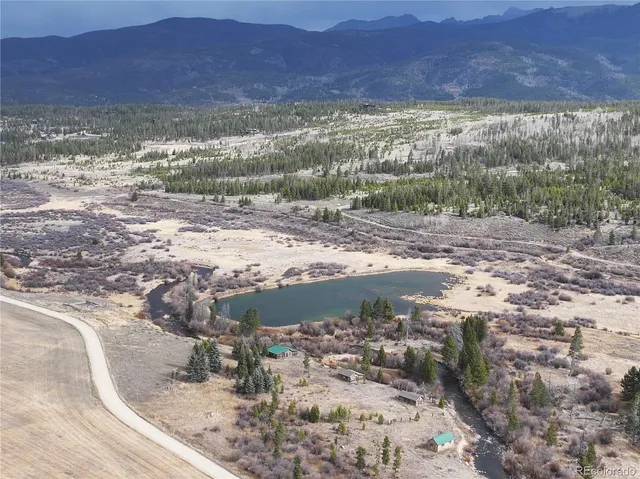 a view of a yard with a mountain