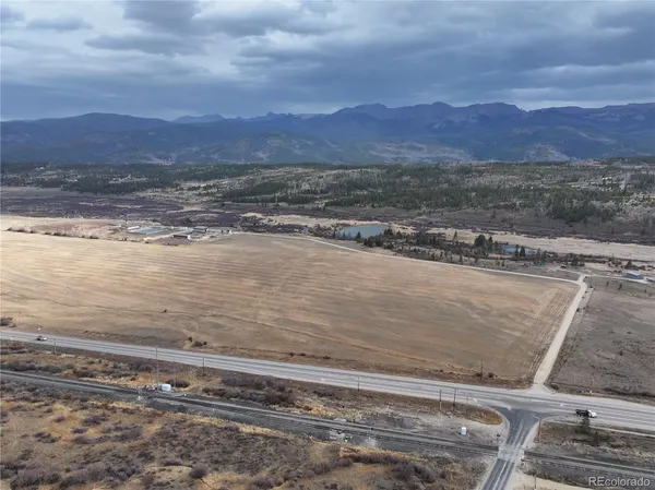 a view of an ocean & mountain