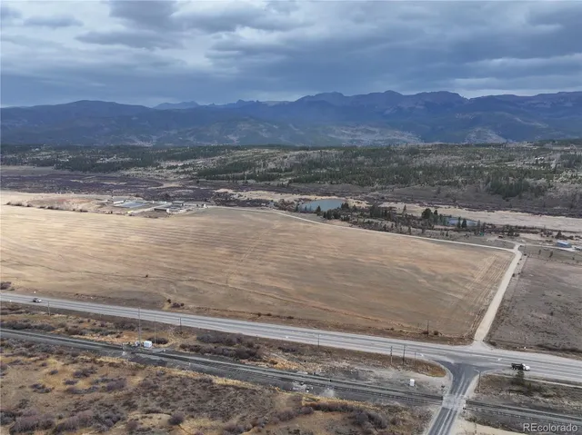 a view of an ocean & mountain