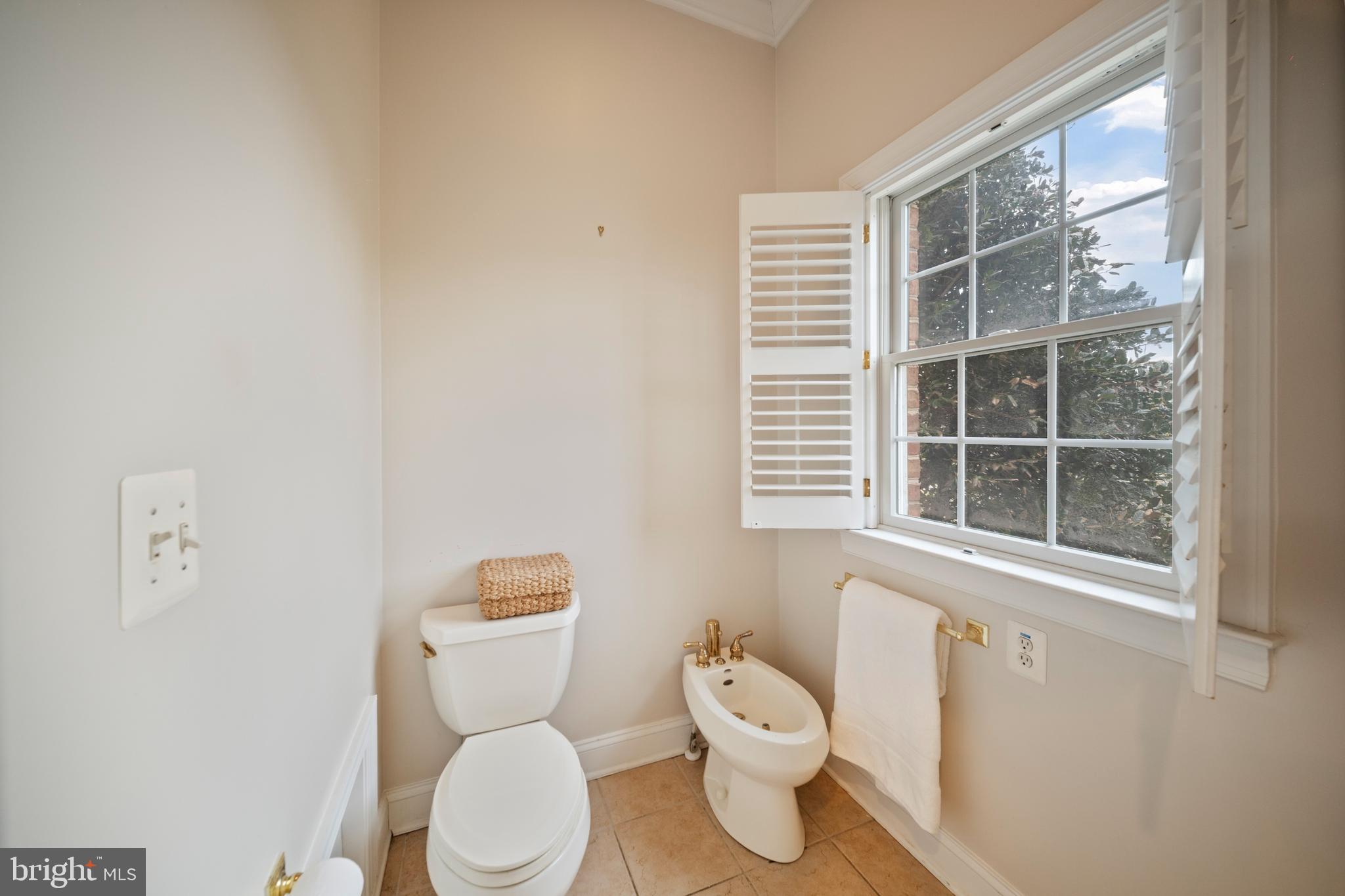 505 Pond View Lane Hunt Valley, MD 21030 - Photo 20 of 104 a white toilet sitting next to a window