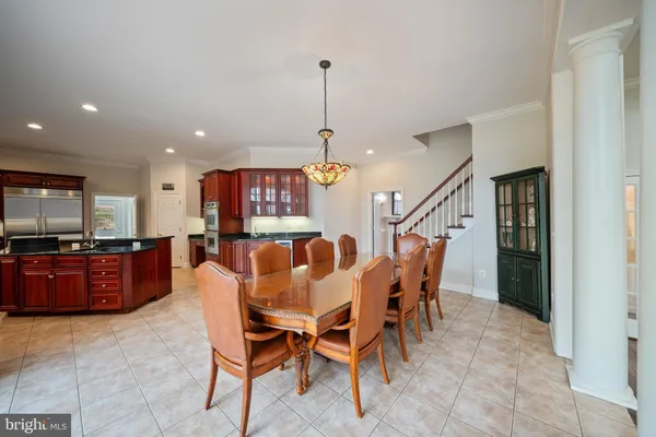 a view of a living room and dining room