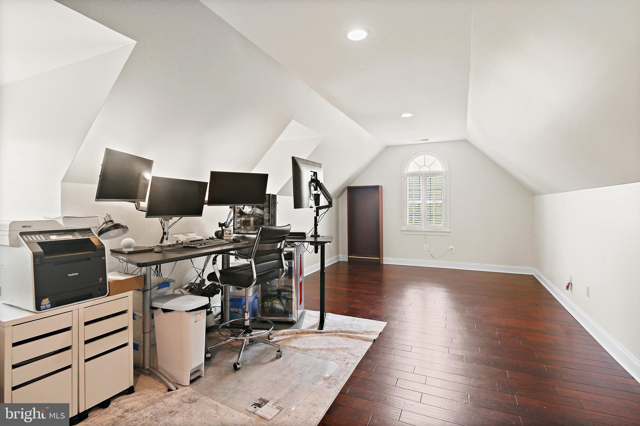 505 Pond View Lane Hunt Valley, MD 21030 - Photo 35 of 104 a view of a workspace with furniture and wooden floor