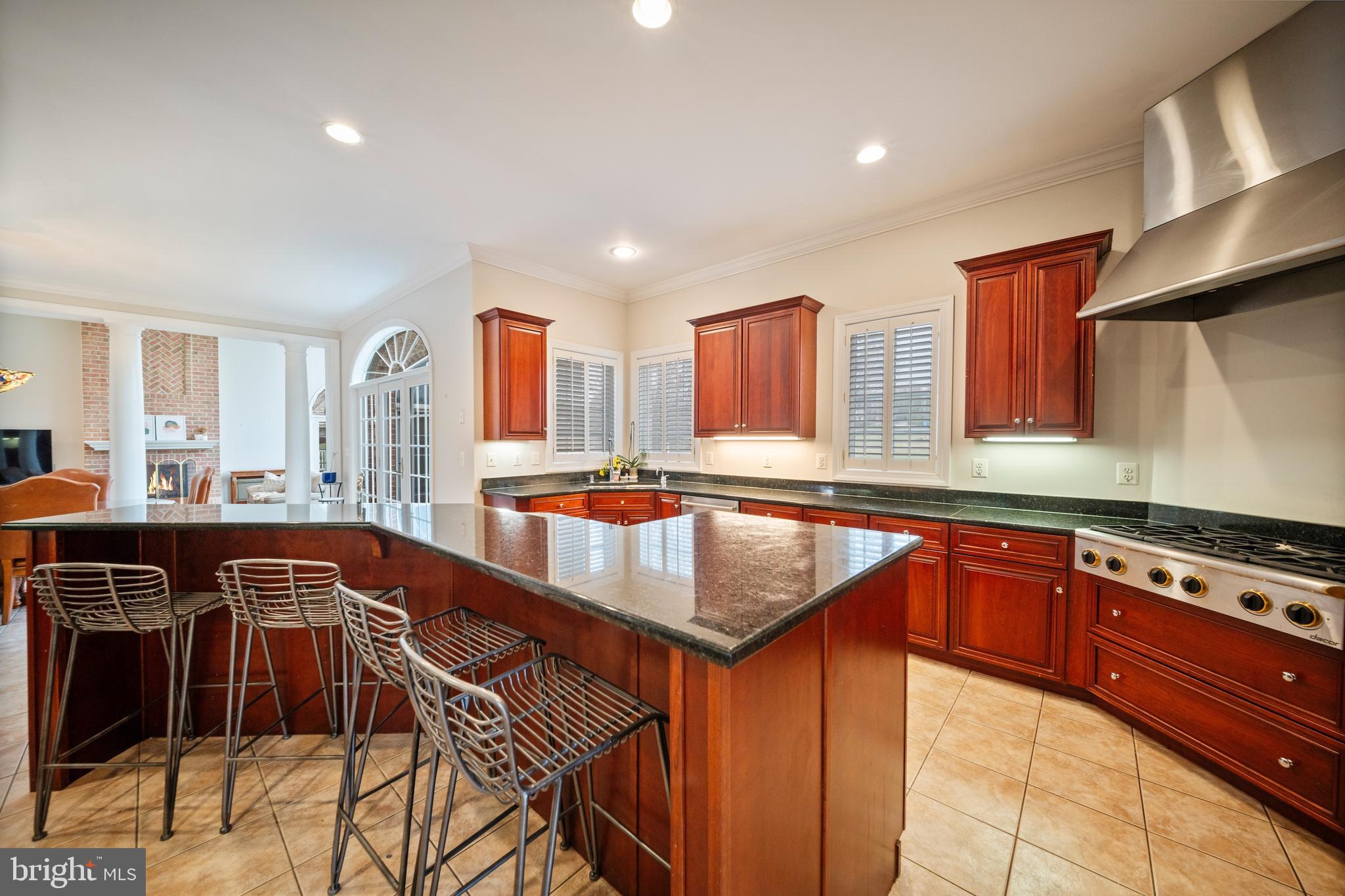 505 Pond View Lane Hunt Valley, MD 21030 - Photo 72 of 104 a kitchen with stainless steel appliances granite countertop a stove a sink and a microwave