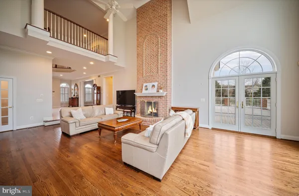 a kitchen with stainless steel appliances granite countertop a sink and a stove