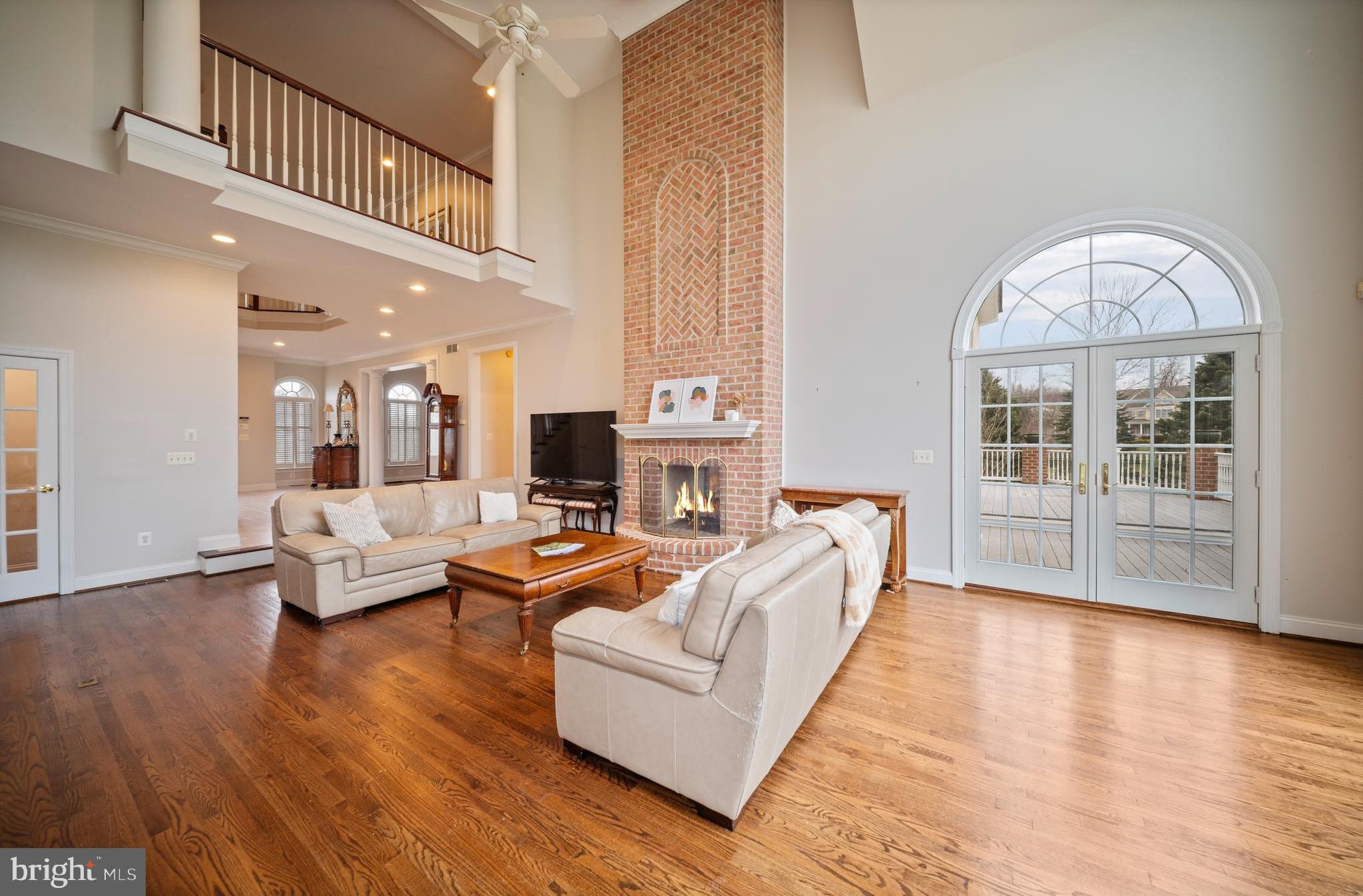 505 Pond View Lane Hunt Valley, MD 21030 - Photo 9 of 79 Living room with brick fireplace
