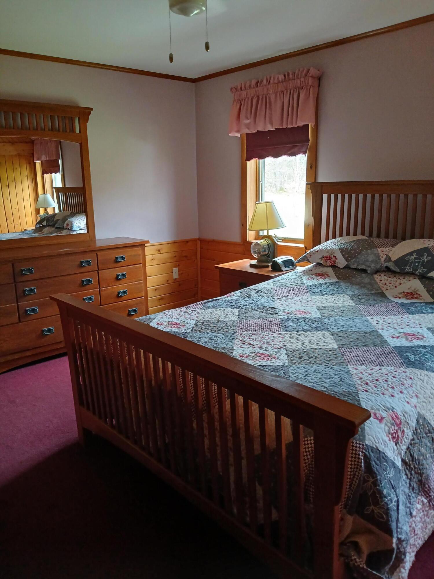 23 Roxy Rand Road New Sharon, ME 04955 - Photo 30 of 51 Downstairs bedroom