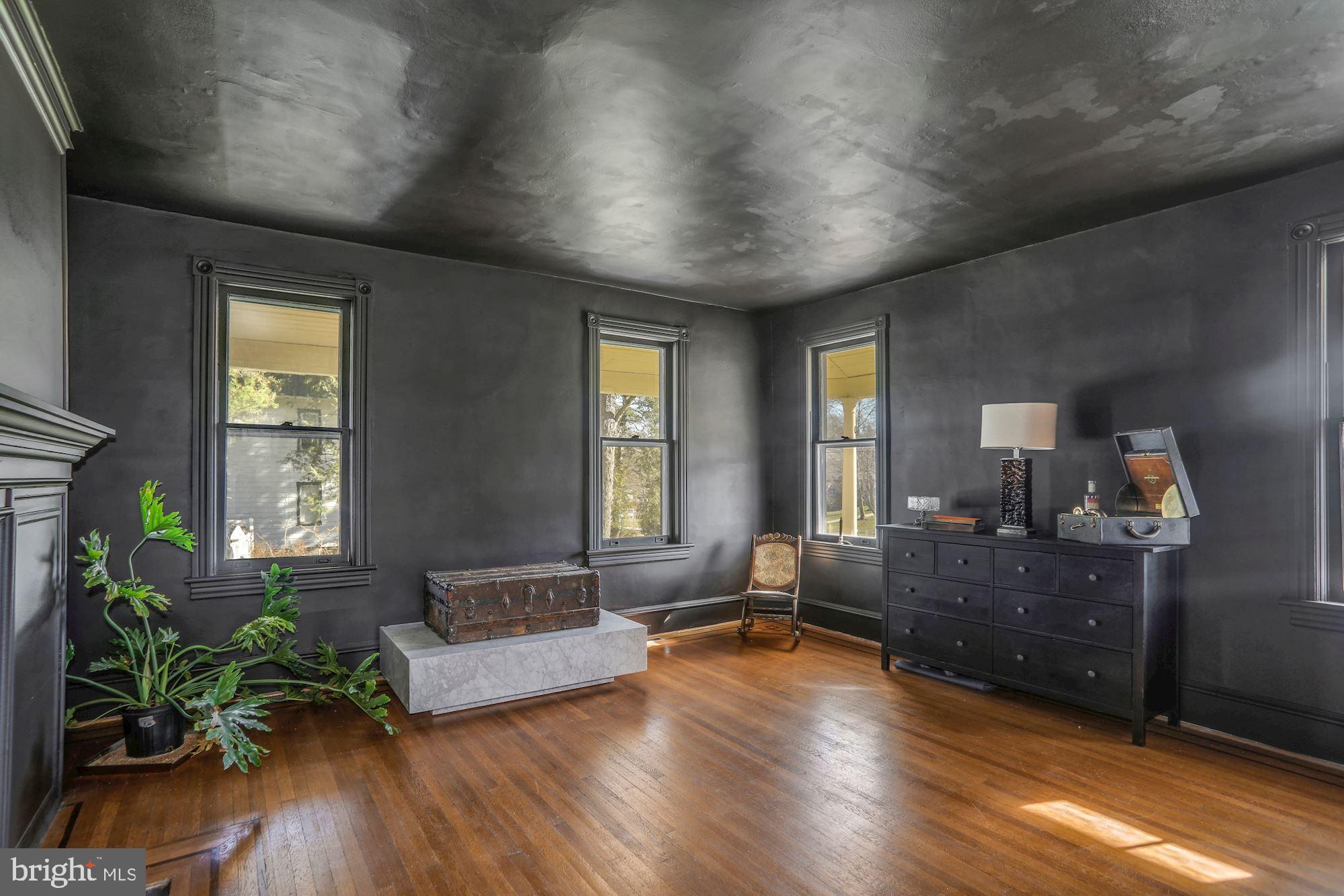 138 Pitman Avenue Pitman, NJ 08071 - Photo 14 of 32 a living room with furniture and a large window