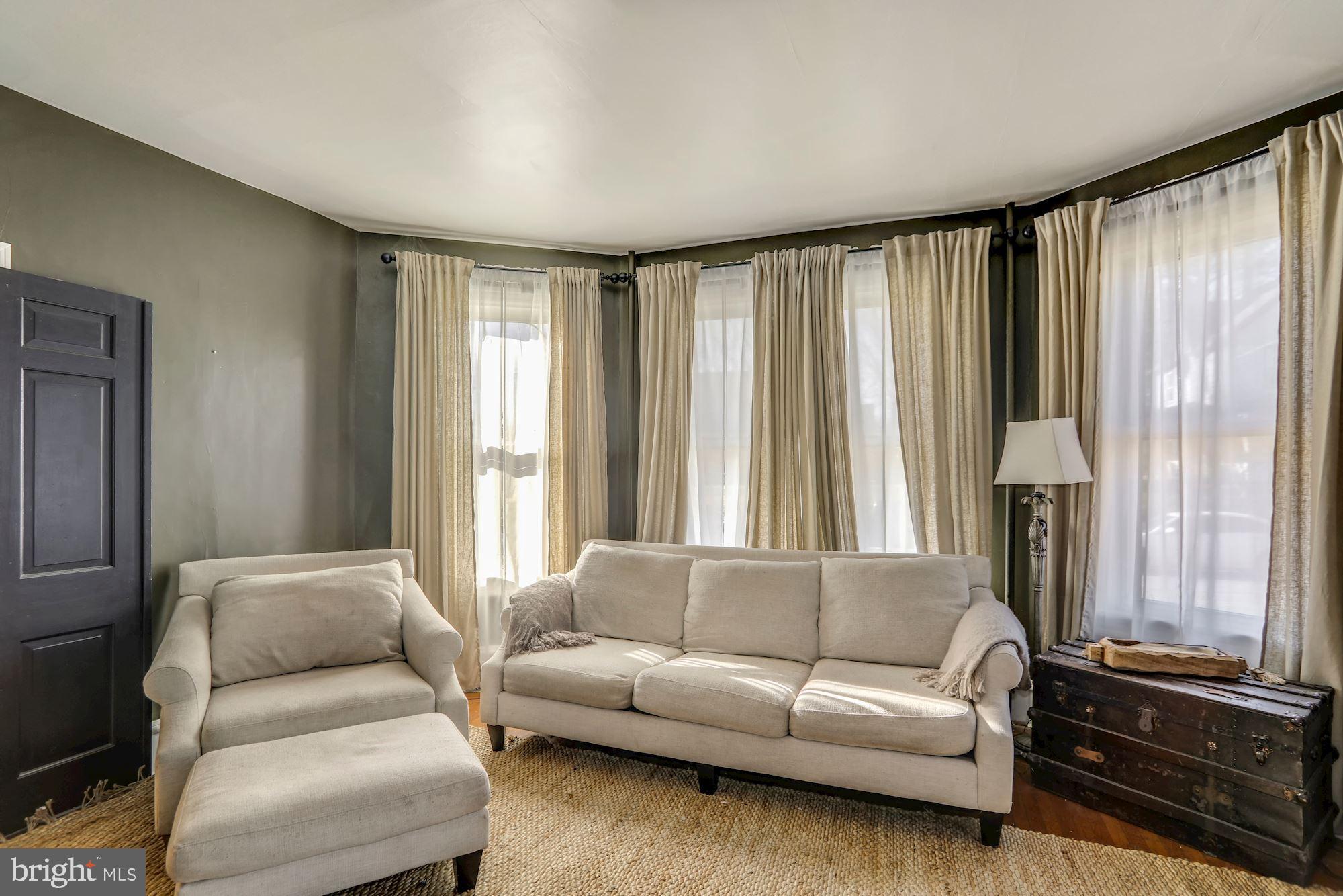 138 Pitman Avenue Pitman, NJ 08071 - Photo 17 of 32 a living room with furniture and a large window