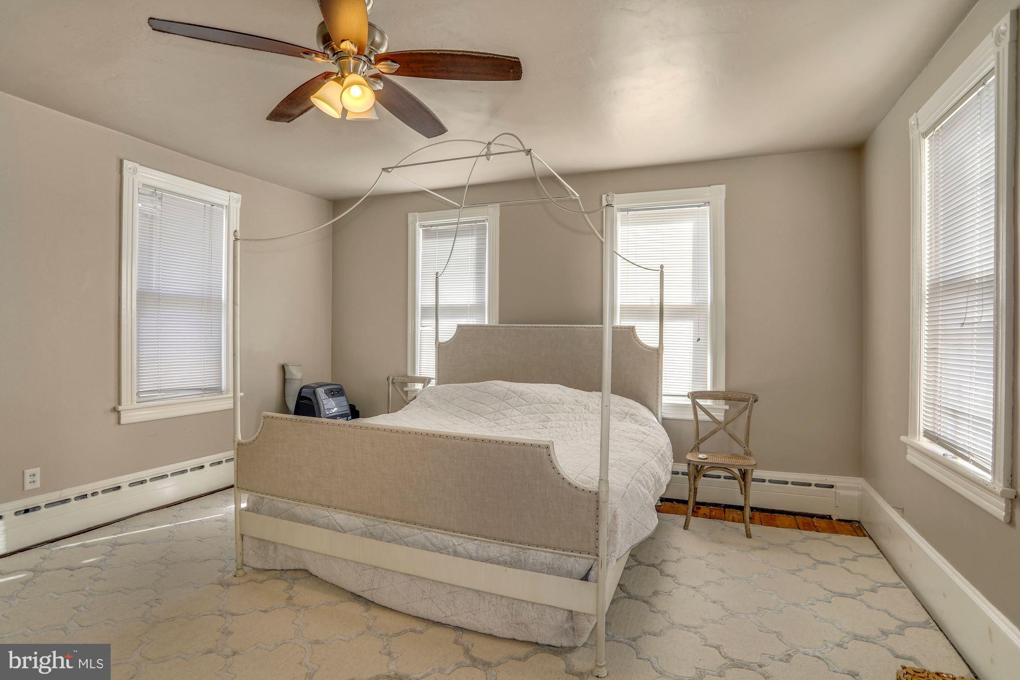 138 Pitman Avenue Pitman, NJ 08071 - Photo 25 of 32 a bedroom with a bed and a window