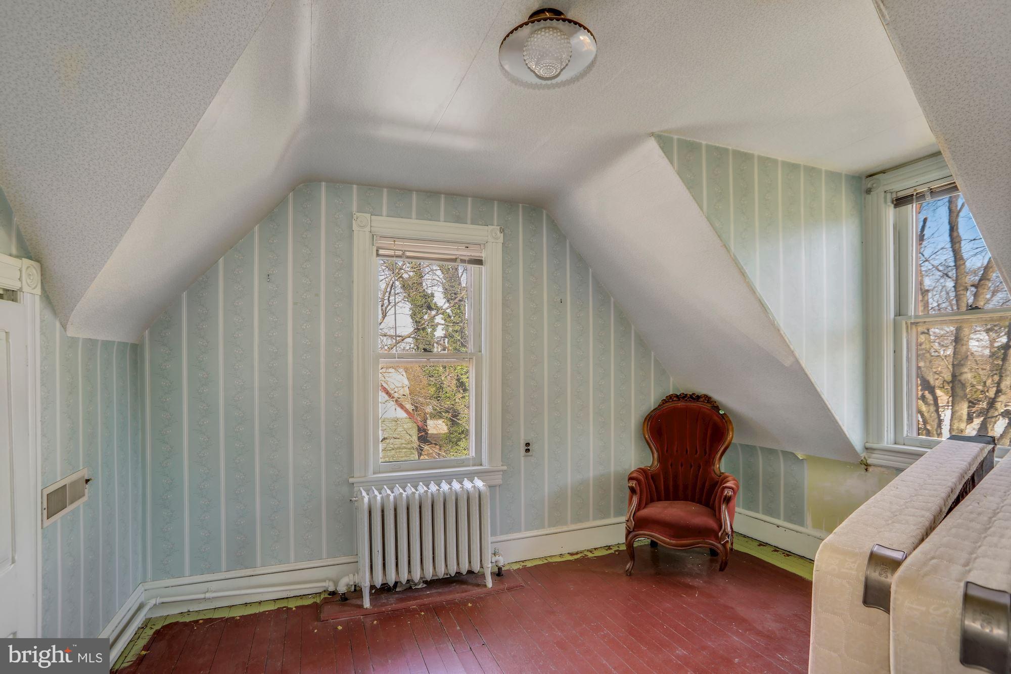 138 Pitman Avenue Pitman, NJ 08071 - Photo 30 of 32 a view of a room with wooden floor and windows