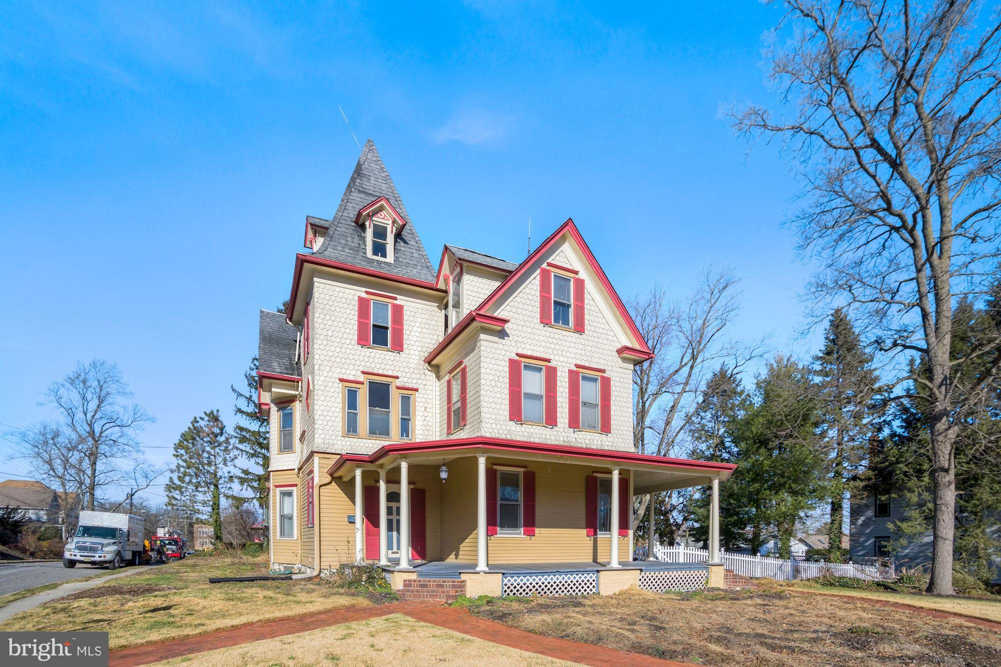 138 Pitman Avenue Pitman, NJ 08071 - Photo 4 of 32 a front view of a residential apartment building with a yard