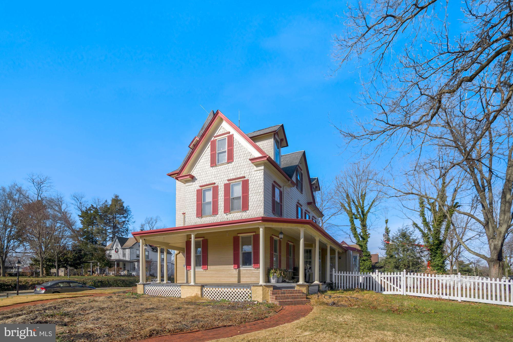 138 Pitman Avenue Pitman, NJ 08071 - Photo 5 of 32 a front view of a house with a yard