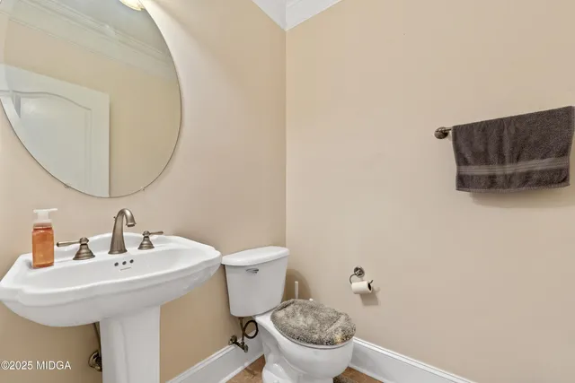 a view of a hallway with stairs